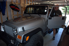 jim-entering-jeep-with-new-lift-kit.jpg