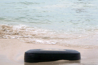 old-tire-on-beach-aruba.jpg