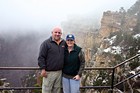 Standing at the South Rim of the Grand Canyon in Arizona. (Notice the snow on the peaks?)