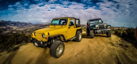 Two Jeep Wranglers on top of the world. 