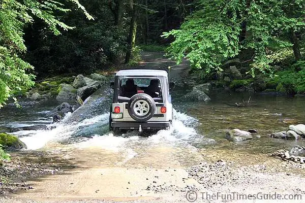 Enjoying a fun water crossing in our Jeep Wrangler Unlimited.
