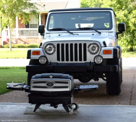 Our Jeep Wrangler Unlimited and Freedom Grill FG50 inside our garage.