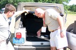 Jim discussion the increased amount of cargo space in

the Jeep Wrangler Unlimited with a staffer at Jeep 101 events.