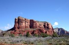Beautiful clear blue skies and mountainous rock forms in Sedona, Arizona -- known for their iron-rich Red Rock.